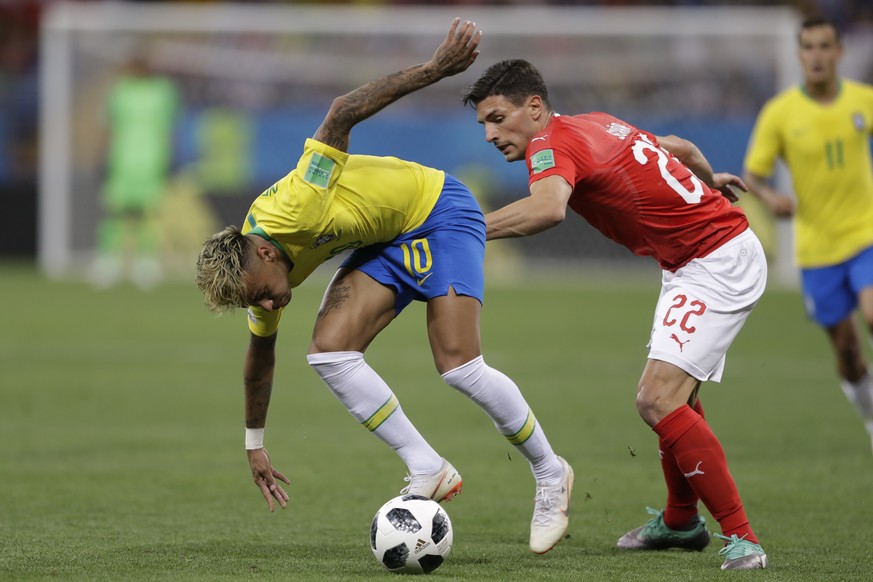 Brazil&#039;s Neymar, left, struggles with Switzerland&#039;s Fabian Schaer during a group E match at the 2018 soccer World Cup in the Rostov Arena in Rostov-on-Don, Russia, Sunday, June 17, 2018. (AP ...