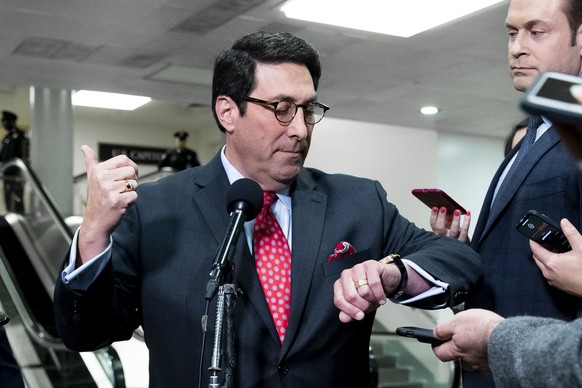 epaselect epa08156660 Attorney Jay Sekulow, a member of the defense team for US President Donald J. Trump for the Senate impeachment trial, looks at his watch while responding to questions from member ...