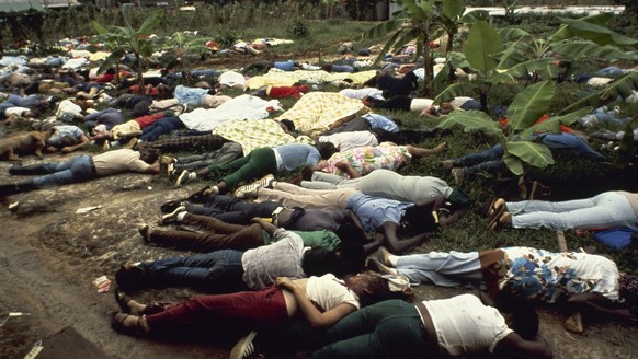 This Nov. 1978 photo shows bodies of followers of cult leader Jim Jones are seen at the Jonestown commune in Guyana, where more than 900 members of the People&#039;s Temple committed suicide. Passage  ...