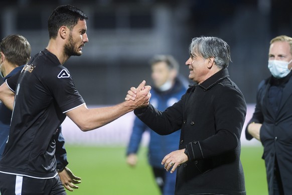 Lugano&#039;s player Miroslav Covilo, left, and Lugano&#039;s Trainer Maurizio Jacobacci, right, celebrate the victory during the Super League soccer match FC Lugano against FC Lausanne Sport at the C ...