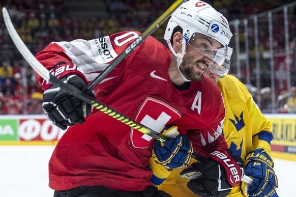 Switzerland&#039;s Roman Josi, left, against Sweden`s William Nylander during the game between Sweden and Switzerland, at the IIHF 2019 World Ice Hockey Championships, at the Ondrej Nepela Arena in Br ...