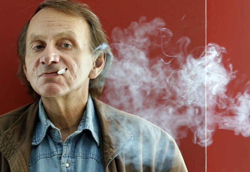 epa05169781 (FILE) A file picture dated 28 April 2015 shows French author Michel Houellebecq, posing for the media during the presentation of his latest book, &#039;Soumission&#039;, in Barcelona, nor ...