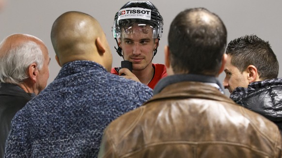 Switzerland&#039;s Roman Josi answers to reporters during a press briefing after a training session, one day before the IIHF 2015 World Championship at the O2 Arena, in Prague, Czech Republic, Thursda ...