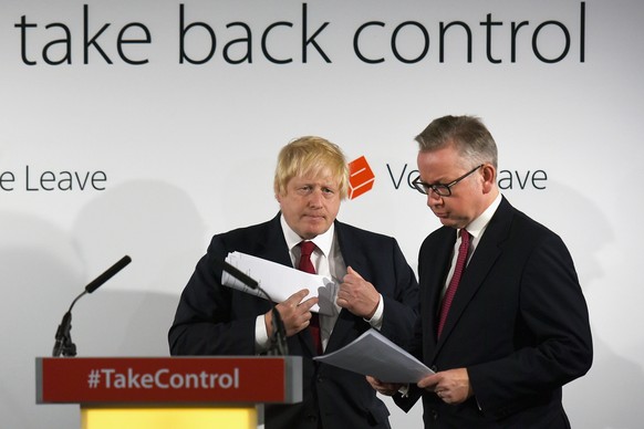 epa06820597 (FILE) - Michael Gove (R) and Boris Johnson (L) swap places as they address the media after their Vote Leave campaign won the United Kingdom&#039;s EU referendum, in London, Britain, 24 Ju ...