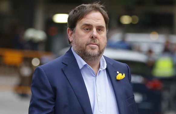 Former Catalan Vice President Oriol Junqueras arrives at the National Court for questioning by a National Court judge investigating possible rebellion charges, in Madrid, Spain, Thursday Nov. 2, 2017. ...