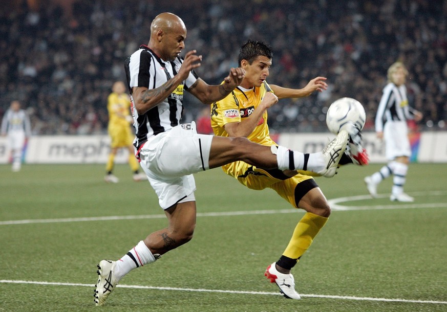 Miguel Portillo from BSC Young Boys Bern, right, fights for the ball with Ruben Olivera from Juventus Turin, during a friendly soccer match between BSC Young Boys Bern and Juventus Turin, Friday Octob ...