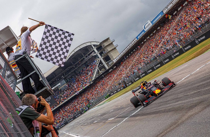 Red Bull driver Max Verstappen of the Netherland&#039;s crosses the finish line to win the German Formula One Grand Prix at the Hockenheimring racetrack in Hockenheim, Germany, Sunday, July 28, 2019.  ...