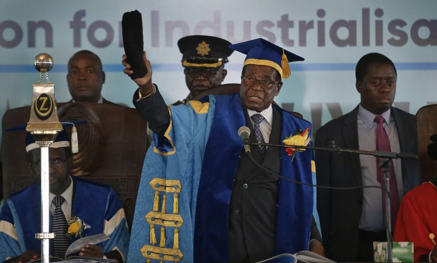 Zimbabwe&#039;s President Robert Mugabe presides over a student graduation ceremony at Zimbabwe Open University on the outskirts of Harare, Zimbabwe Friday, Nov. 17, 2017. Mugabe is making his first p ...