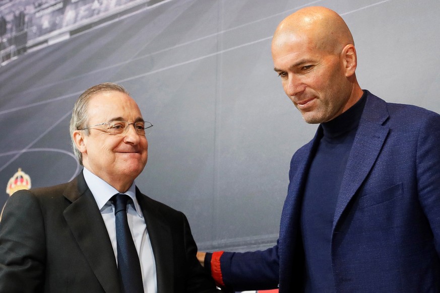 epa06775350 Real Madrid&#039;s president Florentino Perez (L) and Real Madrid&#039;s head coach Zinedine Zidane (R) arrive for a press conference to announce Zidane&#039;s departure at Santiago Bernab ...