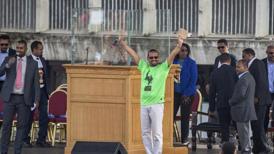 Ethiopia&#039;s Prime Minister Abiy Ahmed waves to the crowd at a large rally in his support, in Meskel Square in the capital, Addis Ababa, Ethiopia Saturday, June 23, 2018. A deadly explosion struck  ...