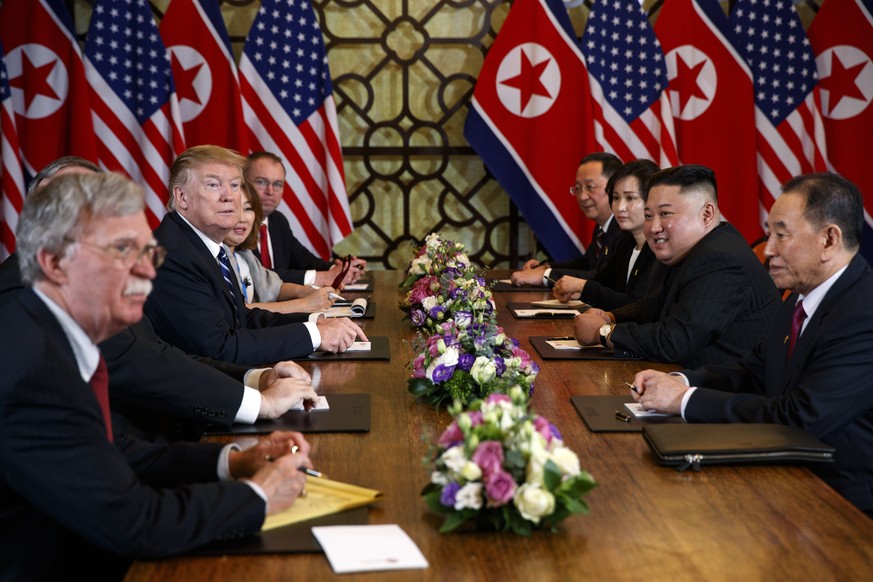 President Donald Trump speaks during a meeting with North Korean leader Kim Jong Un Thursday, Feb. 28, 2019, in Hanoi. At front right is Kim Yong Chol, a North Korean senior ruling party official and  ...
