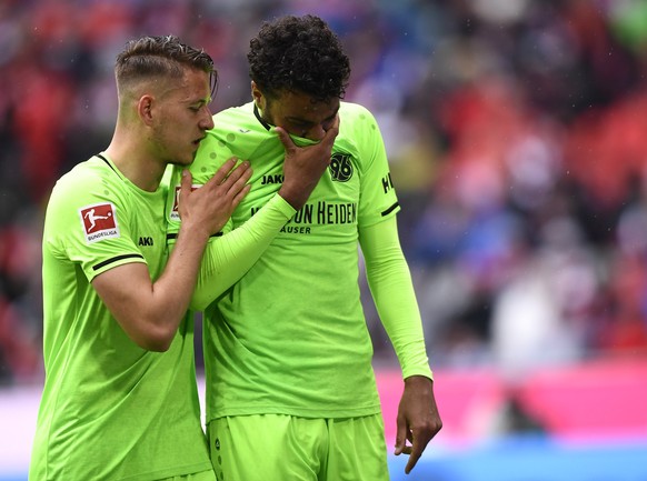 epa07547041 Hannover&#039;s Felipe Trevizan Martins (R) and Pirmin Schwegler (L) react during the German Bundesliga soccer match between Bayern Munich and Hannover 96 in Munich, Germany, 04 May 2019.  ...