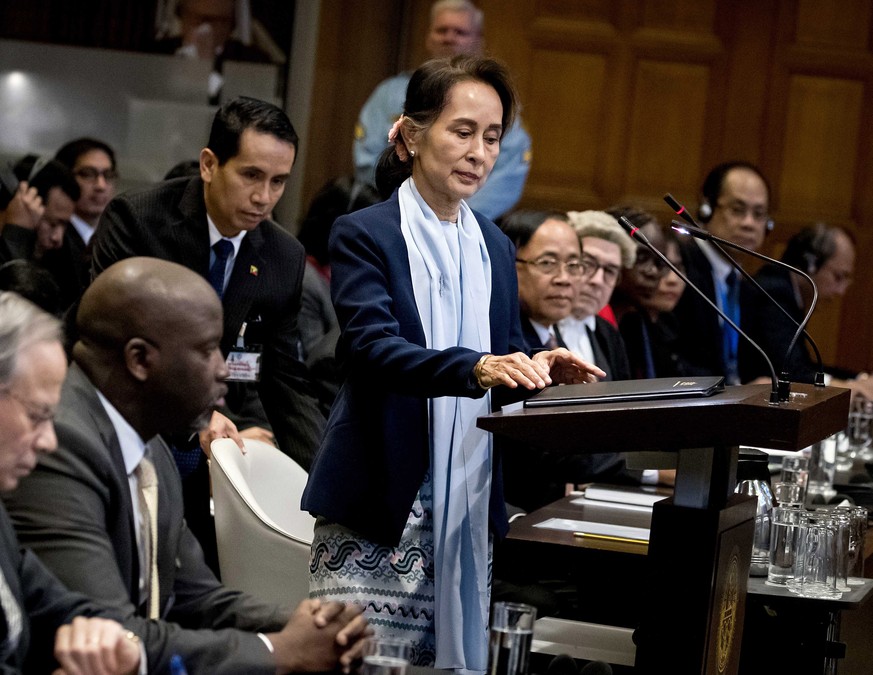 epa08062022 Abubacarr Tambadou (2-L front, seated), minister of justice of The Gambia, and Aung San Suu Kyi (C), Myanmar State Counselor, on the second day before the International Court of Justice (I ...