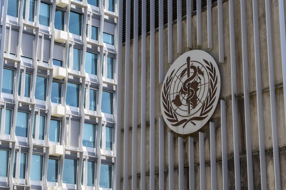 epa08364174 The logo and building of the World Health Organization (WHO) headquarters in Geneva, Switzerland, 15 April 2020. US President Donald Trump announced that he has instructed his administrati ...