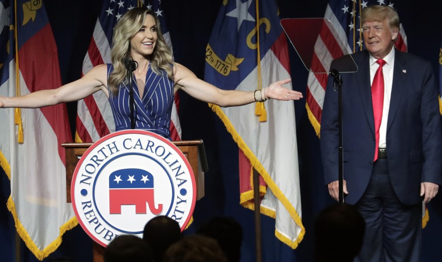 Former President Donald Trump, right, listens as his daughter-in-law Lara Trump speaks at the North Carolina Republican Convention Saturday, June 5, 2021, in Greenville, N.C. Lara is from North Caroli ...
