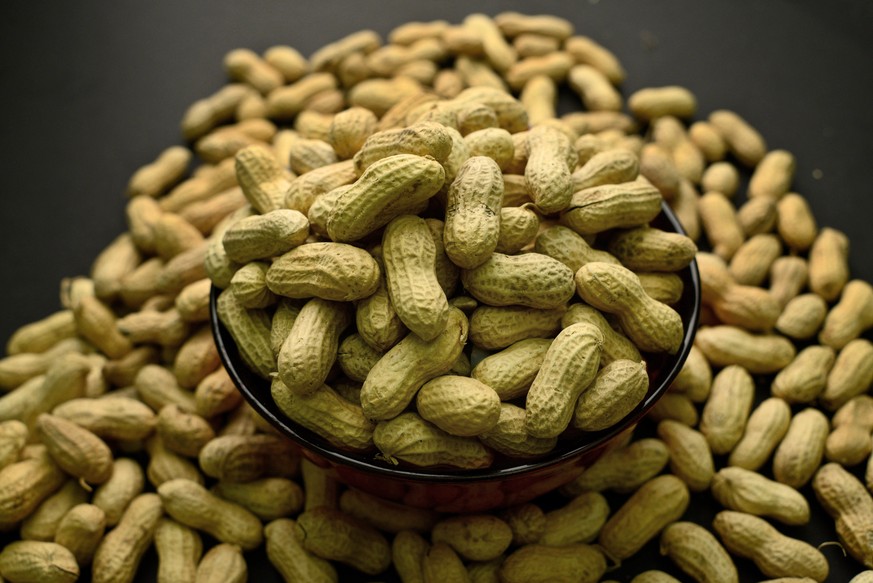 This Feb. 20, 2015 photo shows an arrangement of peanuts in New York. In a statement released online Monday, Aug. 25, 2015 in the journal Pediatrics, a pediatricians&#039; group is recommending that i ...