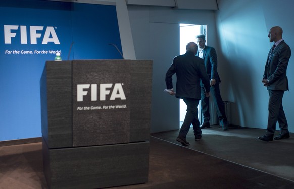 FILE --- FIFA president Joseph S. Blatter leaves a press conference at the FIFA headquarters in Zurich, Switzerland, Tuesday, June 2, 2015. FIFA president Joseph Blatter has been provisionally suspend ...
