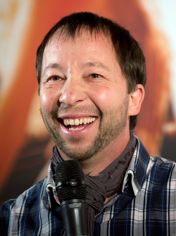 epa04074084 Swiss musician and producer Peter Rene Baumann, aka DJ Bobo, stands in the &#039;Gibson Club&#039; disco during a press conference for the PRG Live Entertainment Awards (PRG LEA) in Frankf ...
