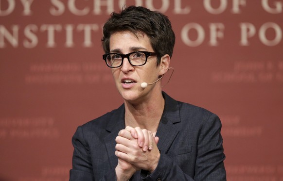 FILE - MSNBC television anchor Rachel Maddow, host of the Rachel Maddow Show, moderates THE &quot;Perspectives on National Security&quot; panel on Oct. 16, 2017, in Cambridge, Mass. Maddow and Mary Tr ...