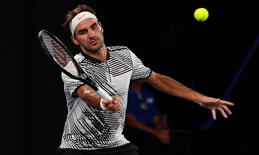 epa05721656 Roger Federer of Switzerland in action against Juergen Melzer of Austria during their Men&#039;s Singles first round match of the Australian Open Grand Slam tennis tournament in Melbourne, ...