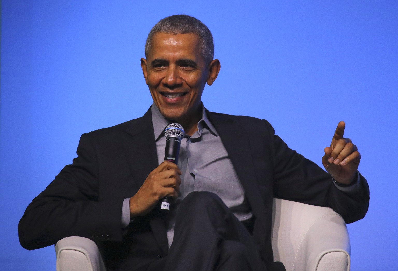 epa08067536 Former US president Barack Obama talks on stage at an Obama Foundation event in Kuala Lumpur, Malaysia, 13 December 2019. Obama and his wife Michelle are in Kuala Lumpur for the inaugural  ...