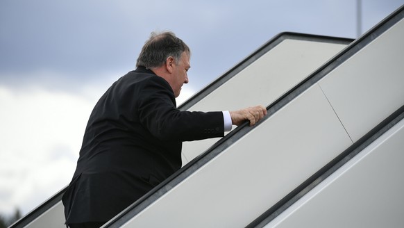 US Secretary of State Mike Pompeo boards a plane at Rovaniemi Airport in Rovaniemi, Finland, after taking part in the 11th Ministerial Meeting of the Arctic Council, Tuesday May 7, 2019. (Mandel Ngan/ ...