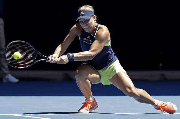 Germany&#039;s Angelique Kerber makes a backhand return to Taiwan&#039;s Hsieh Su-wei during their fourth round match at the Australian Open tennis championships in Melbourne, Australia, Monday, Jan.  ...