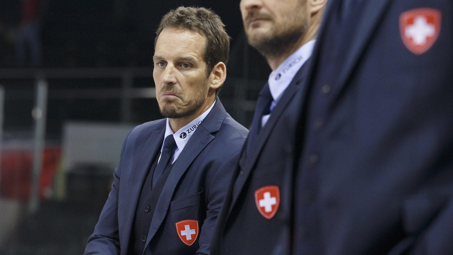 Patrick Fischer, head coach of Switzerland national ice hockey team, reacts, right, during a friendly international ice hockey game between Switzerland and France, at the ice stadium Les Vernets, in G ...