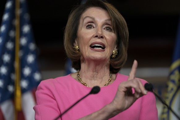 FILE - In this May 23, 2019 file photo, Speaker of the House Nancy Pelosi, D-Calif., meets with reporters at the Capitol in Washington. An altered video claiming to show Pelosi slurring her words duri ...