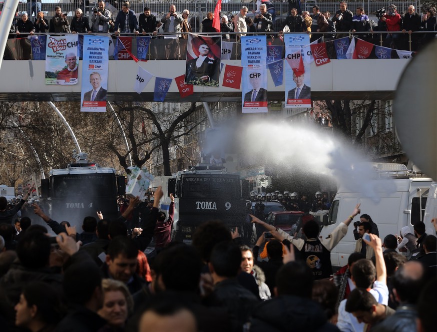 Police use water cannons to break up a protest by hundreds of people who had gathered outside Turkey’s Supreme Election Council building in support of the country’s main opposition party which is chal ...
