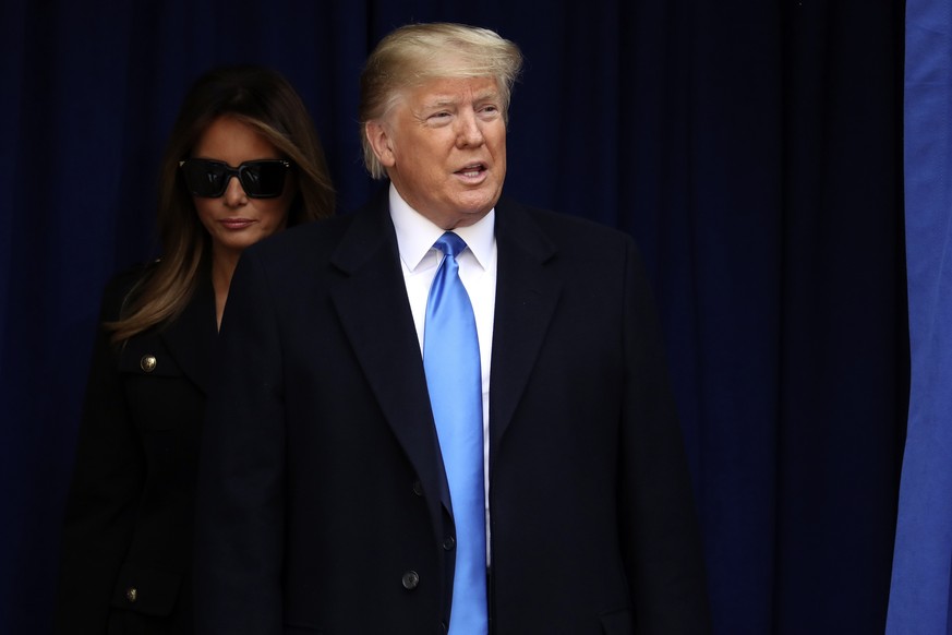 President Donald Trump and first lady Melania Trump arrive at the New York City Veterans Day Parade at Madison Square Park in New York, Monday, Nov. 11, 2019. (AP Photo/Andrew Harnik)
Donald Trump,Mel ...
