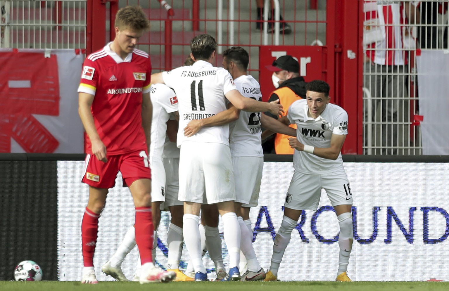 Augsburg&#039;s scorer Ruben Vargas, right, and his teammates celebrate the opening goal during the German Bundesliga soccer match between 1. FC Union Berlin and FC Augsburg in Berlin, Germany, Saturd ...