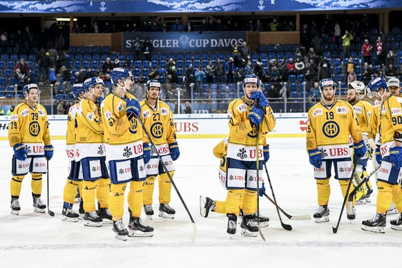 Davos&#039; Enzo Corvi and the team after losing the game between TPS Turku and HC Davos, at the 93th Spengler Cup ice hockey tournament in Davos, Switzerland, Sunday, December 29, 2019. (KEYSTONE/Mel ...