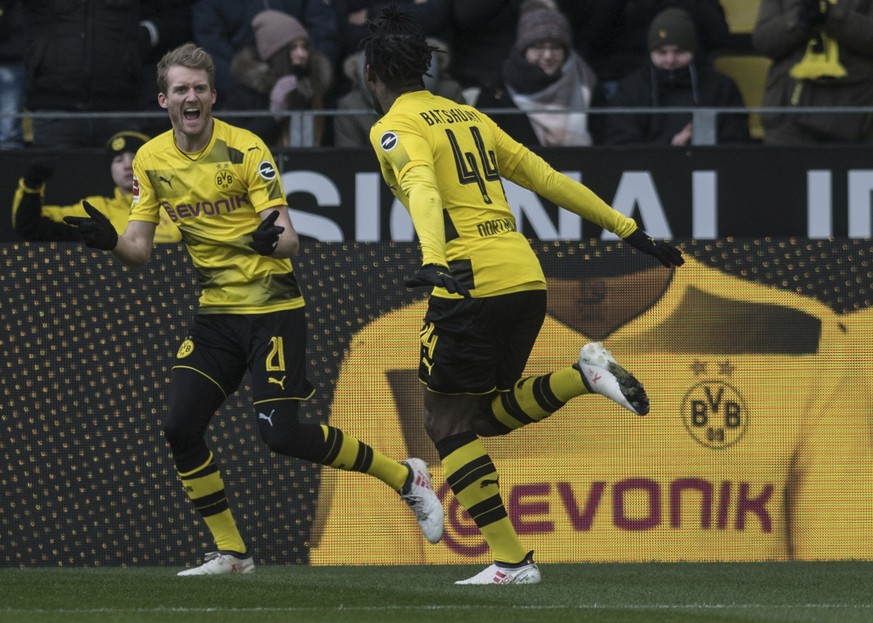 Dortmund&#039;s Michy Batshuayi, right, and teammate Andre Schuerrle celebrate the opening goal during the German Bundesliga soccer match between Borussia Dortmund and Hannover 96 in Dortmund, Germany ...