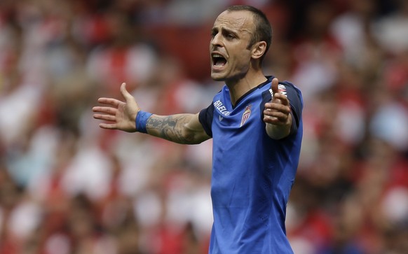 AS Monaco&#039;s Dimitar Berbatov shouts and gestures in frustration after a teammate failed to pass to him during the Emirates Cup soccer match between AS Monaco and Valencia at Arsenal&#039;s Emirat ...