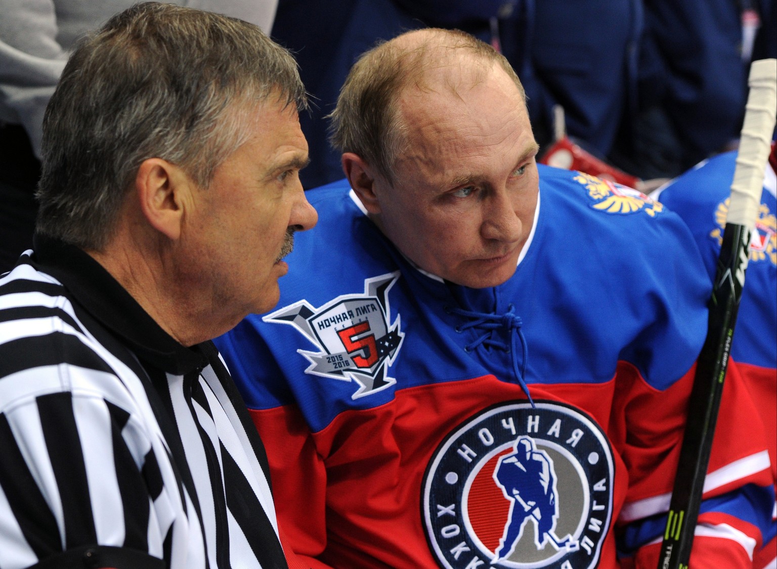 Russian President Vladimir Putin, right, speaks with IIHF President Rene Fasel as he takes part in a gala match of the Night Hockey League in the Bolshoy Ice Dome in the Black Sea resort of Sochi, Rus ...