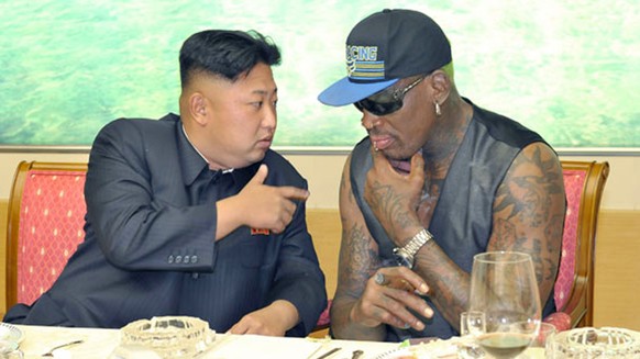 In this undated photo published on Sept. 7, 2013, on the homepage of North Korea&#039;s Rodong Sinmun newspaper, North Korean leader Kim Jong Un, left, talks with former NBA player Dennis Rodman durin ...