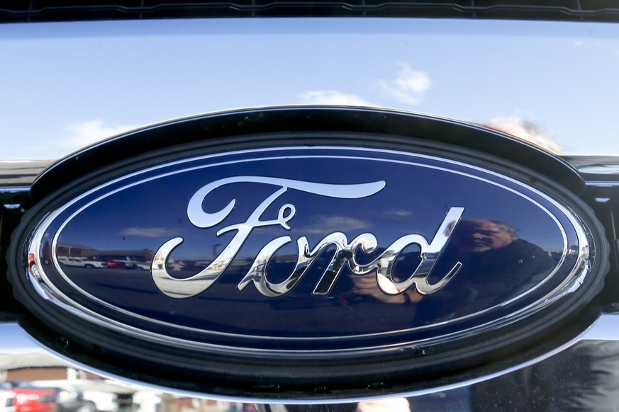 FILE - This Thursday, Nov. 19, 2015, file photo, shows the Ford badge in the grill of a pickup truck. Ford is telling owners of about 2,900 2006 Ranger pickup trucks not to drive them after discoverin ...