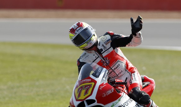 Switzerland&#039;s rider Dominique Aegerter of the MV Agusta Idealavoro Forward waves to supporters at the end of the Moto2 race at the British Motorcycle Grand Prix at the Silverstone racetrack, in S ...