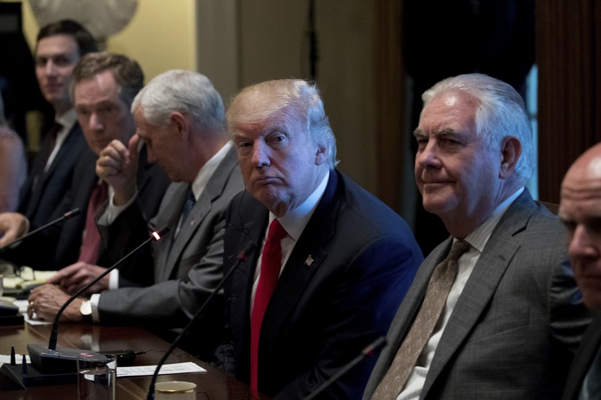 From left, White House Senior Adviser Jared Kushner, U.S. Trade Representative Robert Lighthizer, Vice President Mike Pence, President Donald Trump, Secretary of State Rex Tillerson and National Secur ...