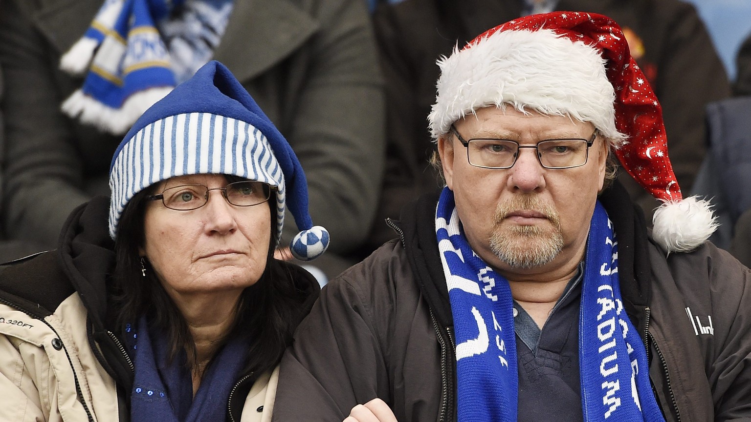 epa05081230 Chelsea supporters wearing festive hats before the start of the English Premier League soccer match between Chelsea and Watford at Stamford Bridge in London, Britain, 26 December 2015. EPA ...