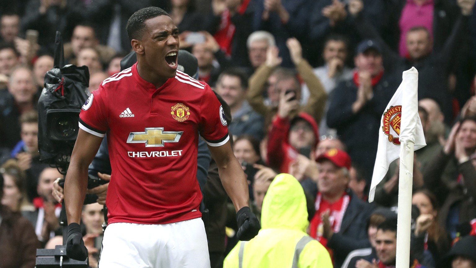 Manchester United&#039;s Anthony Martial celebrates scoring his side&#039;s first goal of the game during the English Premier League soccer match between Manchester United and Tottenham Hotspur, at Ol ...