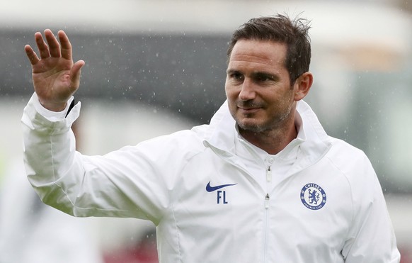 Chelsea manager Frank Lampard waves as he walks on the pitch before the pre-season friendly match against Bohenians, at Dalymount Park in Dublin, Ireland, Wednesday July 10, 2019. Lampard makes his de ...