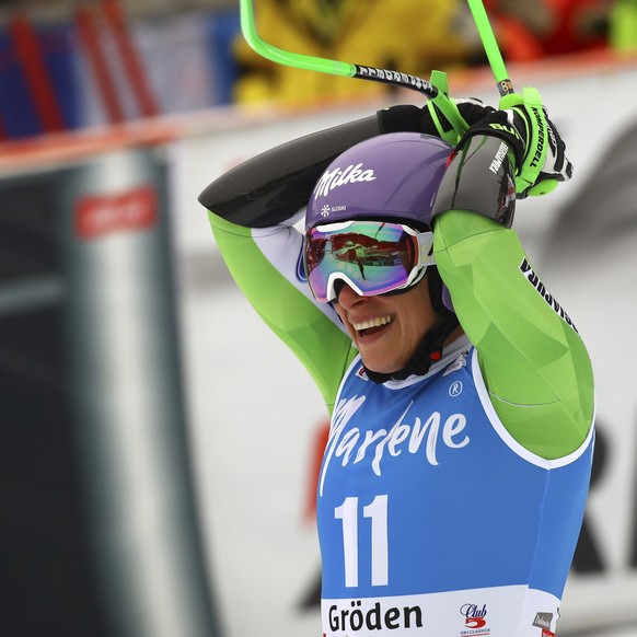 Slovenia&#039;s Ilka Stuhec celebrates as she crosses the finish line of an alpine ski, women&#039;s World Cup Super-G, in Val Gardena, Italy, Wednesday, Dec. 19, 2018. (AP Photo/Alessandro Trovati)