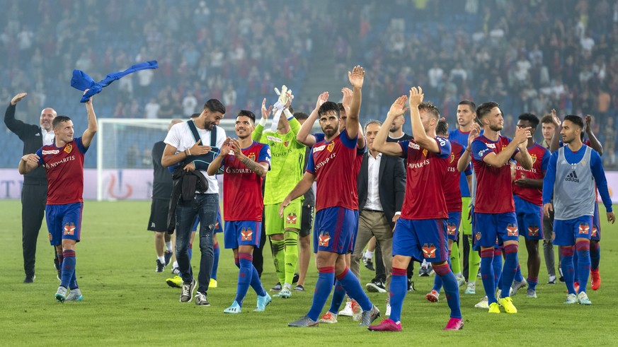 Basel&#039;s players cheer after winning the UEFA Champions League second qualifying round second leg match between Switzerland&#039;s FC Basel 1893 and Netherland&#039;s PSV Eindhoven in the St. Jako ...