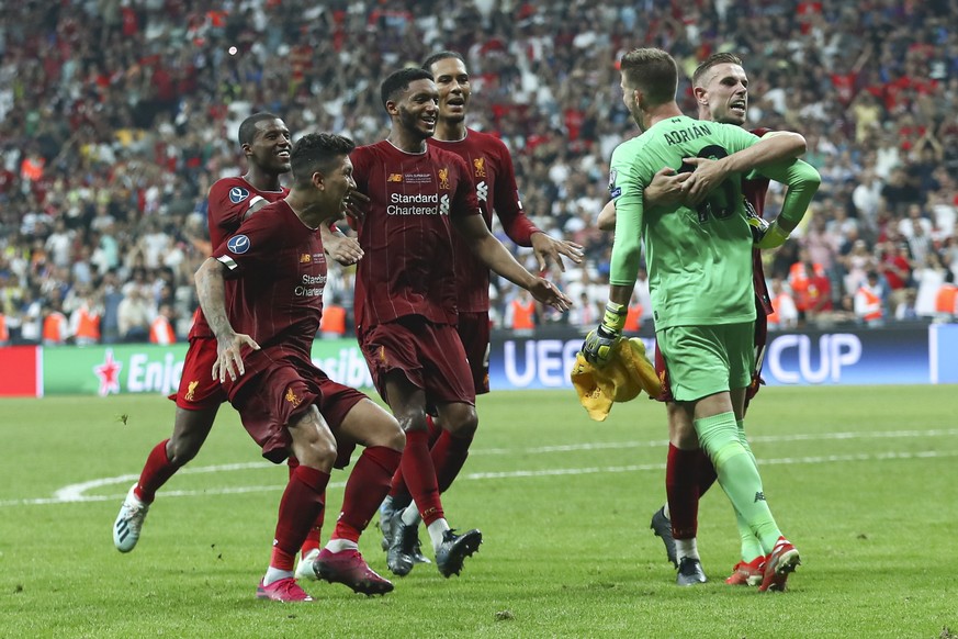 epa07773876 Liverpool&#039;s goalkeeper Adrian (2-R) celebrates with team mates after winning the UEFA Super Cup match between Liverpool FC and Chelsea FC in Istanbul, Turkey, 14 August 2019. EPA/SEDA ...