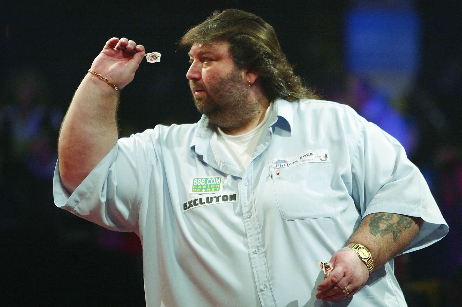 FRIMLEY GREEN, ENGLAND - JANUARY 11: Andy Fordham of England in action against Mervyn King of England during the final of The BDO Lakeside World Darts Championships at the Lakeside on January 11, 2004 ...