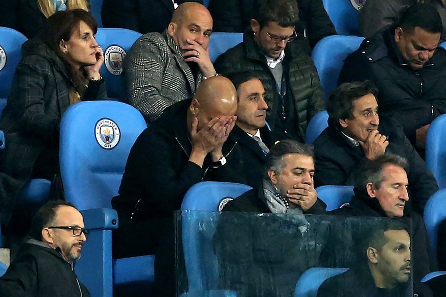 epaselect epa06660291 Manchester City&#039;s head coach Pep Guardiola (L) reacts on the tribune after he has been sent off the pitch during the UEFA Champions League quarter final second leg match bet ...