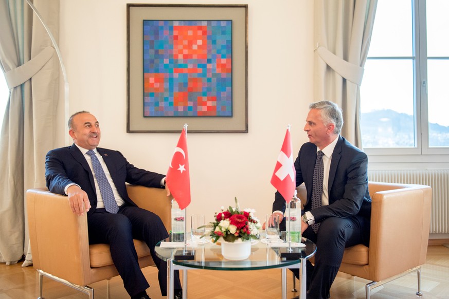Turkey&#039;s Foreign Minister Mevlut Cavusoglu (L) and Switzerland&#039;s Federal Councillor Didier Burkhalter talk during Cavusoglu&#039;s visit to Switzerland follwing a weeks-long dispute between  ...