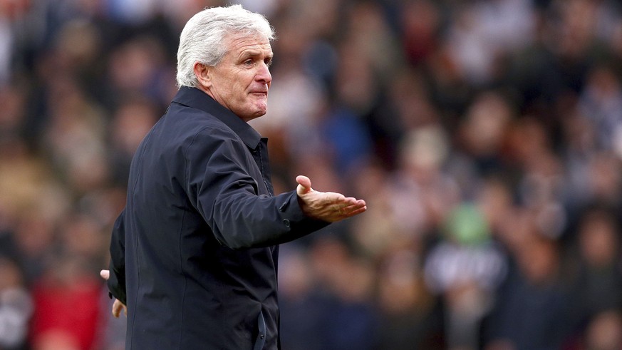 Stoke City manager Mark Hughes gestures on the touchline during the match against Newcastle United, during their English Premier League soccer match at the bet365 Stadium in Stoke, England, Monday Jan ...